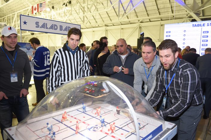 Dufferin Concrete Employees at the Bubble Hockey