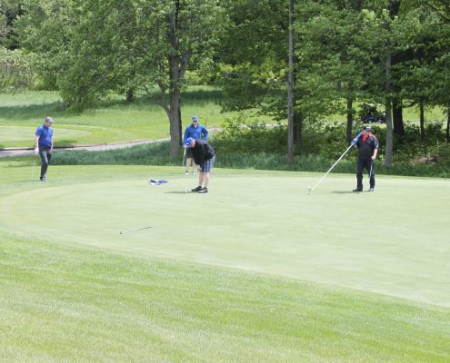 4 Customers and employees playing golf during the Dufferin Concrete Golf Fundraiser Tournament Camp Ooch